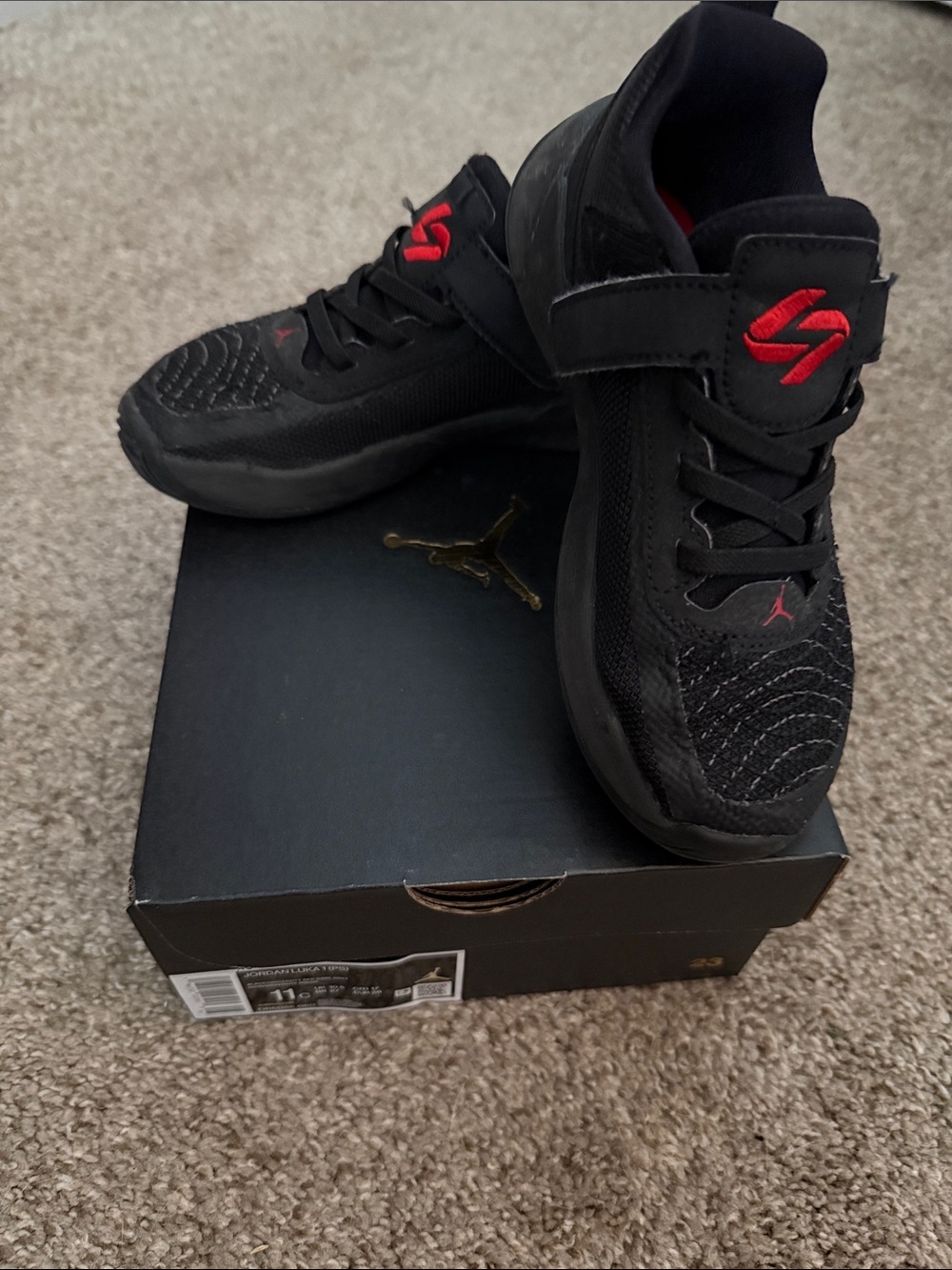Jordan Kids Black Sneakers with Red Accents
